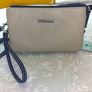 Stone &  Co. Founded leather wristlet purse.